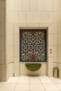 The decorative washbasin with drinking water in the Sheikh Zayed Grand Mosque in Abu Dhabi city, United Arab Emirates