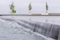 Decorative waterfall in big fountain. Selective focus Royalty Free Stock Photo
