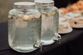 Decorative wedding outdoor party drink station with lemonade