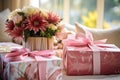 decorative wedding presents on a table with floral arrangement