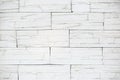 Decorative white brick wall, plaster light background, building wall