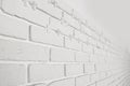 Decorative white bricks with tile leveling system on wall Royalty Free Stock Photo