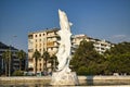 Decorative white dolphin statue in a water fountain in Karsiyaka, Izmir, Turkey