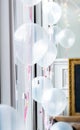 Decorative white wedding balloons at the reception