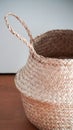 A decorative wicker bamboo basket