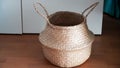A decorative wicker bamboo basket