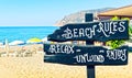 Decorative wooden advertising sign for small cafe on famous Keykubat Beach in the heart of Alanya