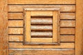 Decorative wooden boards texture made to look like window blinds on new wooden house wall Royalty Free Stock Photo