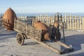 Decorative wooden cart with earthenware jug stands on a shore near the sea water in Batumi, Georgia Royalty Free Stock Photo