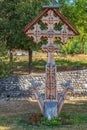 Decorative wooden carved cross with Romanian traditional motifs, Maramures, Romania