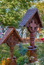 Decorative wooden carved cross with Romanian traditional motifs, Maramures, Romania