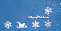 Decorative wooden Christmas snowflakes and sleighs on blue background. Festive New Year card in trendy color Royalty Free Stock Photo