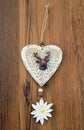 Decorative wooden heart with deer and edelweis flower