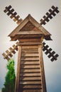 Decorative wooden weather vane. Decoration of a country house
