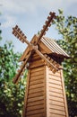 Decorative wooden weather vane. Decoration of a country house