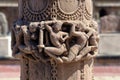Decoratively carved stone pillar