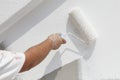 Decorator painting wall Royalty Free Stock Photo