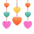 Decortive elements with pom-poms in the shape of a heart