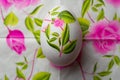 Decoupage Easter egg, Decorated with flowered paper napkins above view