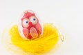 Decoupege decorated Easter egg in a nest Royalty Free Stock Photo