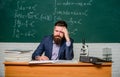 Decreased energy level. Tired teacher in class. Bearded man suffer from headache. Being tired of work. Tired and Royalty Free Stock Photo