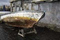 Decrepit old row boats in the harbor in Naples Royalty Free Stock Photo