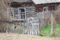 Decrepit wooden fence of the village house
