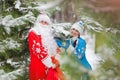 Ded Moroz (Father Frost) and Snegurochka (Snow Maiden) with gifts bag Royalty Free Stock Photo