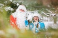 Ded Moroz (Father Frost) and Snegurochka (Snow Maiden) with gifts bag Royalty Free Stock Photo