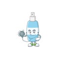 A dedicated Doctor spray hand sanitizer Cartoon character with stethoscope Royalty Free Stock Photo
