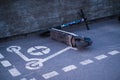 Dedicated electric scooter parking spot on city sidewalk