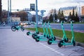 Dedicated electric scooter parking spot on city sidewalk