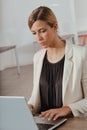 Dedicated hardworking businesswoman concentrating on her work Royalty Free Stock Photo