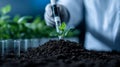 Scientist in lab coat analyzes soil samples for sustainable agriculture and conservation in modern lab setting Royalty Free Stock Photo