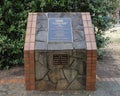 Dedication plaque on a stone base for the Dr. Glenn Mitchell Memorial Park in in McKinney, Texas