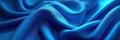 Deep azure cloth billows creating dynamic folds folds graceful
