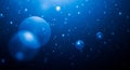 Deep Blue Abstract Bubbles and Light Flares Underwater Background image photo Royalty Free Stock Photo