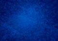 Deep blue bokeh background with light texture effect