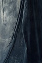 Draped Dark Fabric: A Moody Textured Study in Deep Blues Royalty Free Stock Photo
