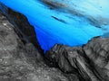 Deep and blue glacier cave