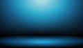 Blue gradient studio background with spotlight Royalty Free Stock Photo