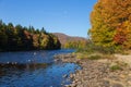 The deep blue Jacques-Cartier river set against the Laurentian mountains Royalty Free Stock Photo