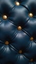 Deep blue leather upholstery with gold buttons. Texture design with button tufting detail. Stylish abstract backdrop. Elegant Royalty Free Stock Photo