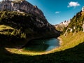 Deep blue mountain lake in swiss alps, switzerland Royalty Free Stock Photo