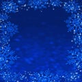 Deep blue mystical bokeh and snowflake fame background