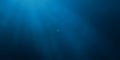 Deep blue ocean background with light beams Royalty Free Stock Photo