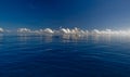 Deep blue ocean and white clouds Royalty Free Stock Photo