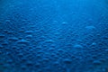 Deep blue raindrops abstract background.