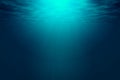 Deep blue sea with rays of sunlight, ocean surface seen from underwater. Royalty Free Stock Photo