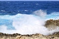 Deep blue sea, swirling waves, cold rocks. Gozo Island. Royalty Free Stock Photo